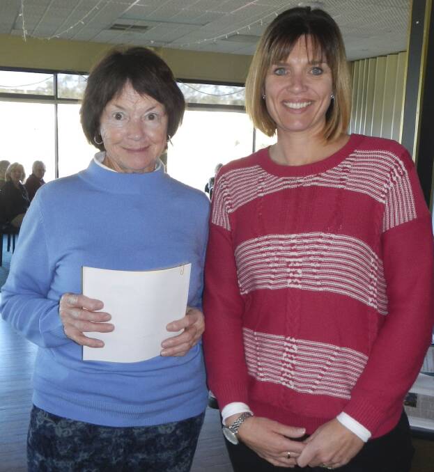  RUNNER-UP: Runner-up division one Jenny Parnell and trophy donor Helen Wright.  