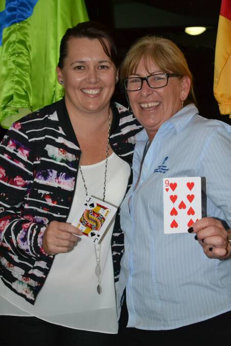 HOLDING ALL THE CARDS: Proving winners are grinners at the Mollymook Turf Club sponsors night on Friday are Sally Stewart from Stewart’s Catering and Karen Bashford from South Coast Business and Financial Solutions. 