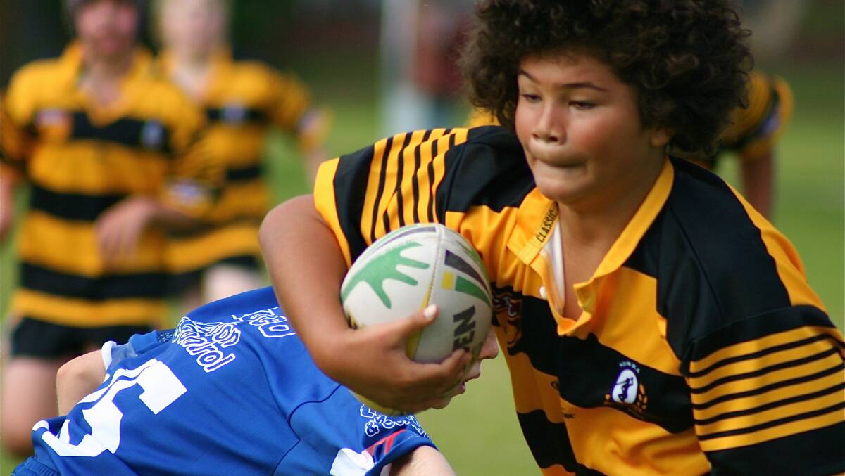 TOO QUICK: Under 12’s Nowra Warrior Sam Tukuafu makes a break during his team’s valiant loss to Gerringong in last weekend’s junior League round.  