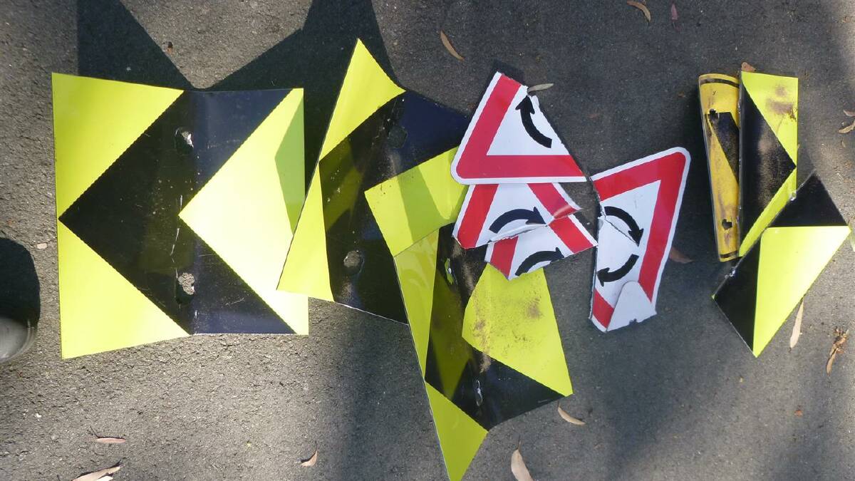 Wrecked street signs at the Shoalhaven Heads Learn to Ride track.