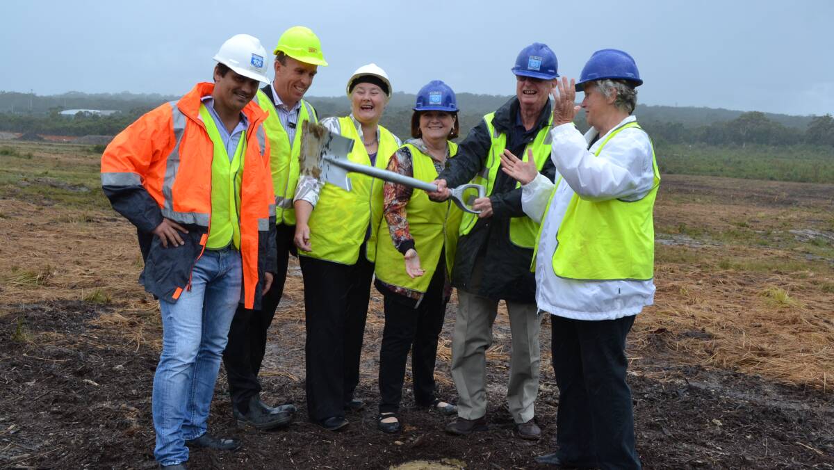 Woolworths regional manager Levi Corby and development manager Wes Dose, Gilmore MP Ann Sudmalis, South Coast MP Shelley Hancock, Vincentia Ratepayers and Residents Association member Brian Saunders and Shoalhaven Mayor Joanna Gash celebrate the beginning of construction on the Vincentia Marketplace Woolworths.
