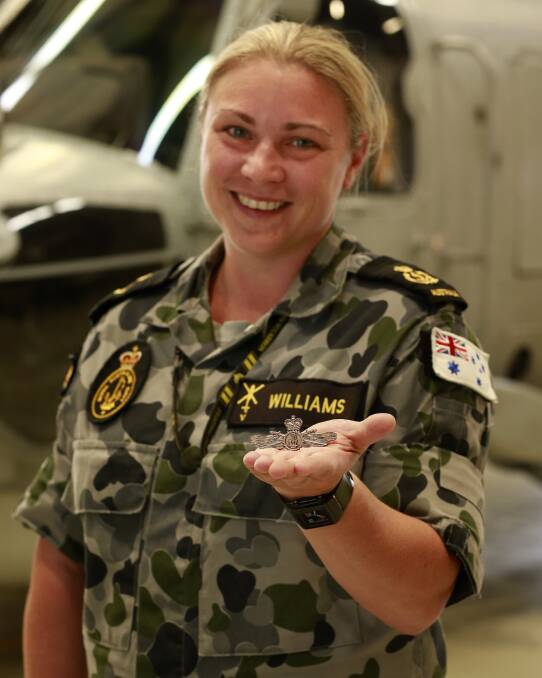 Chief Petty Officer (aviation technician avionics) Amy Williams from HMAS Albatross has attained a qualification making her the first woman in her squadron to do so. Photo: DEPARTMENT OF DEFENCE