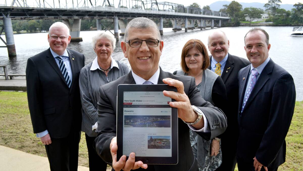 Member for Kiama Gareth Ward, Shoalhaven Mayor Joanna Gash, Minister for the Illawarra John Ajaka, Member for South Coast Shelley Hancock, Member for Heathcote Lee Evans and Upper House member Paul Green launch the official NSW government Illawarra website in Nowra on Wednesday.
