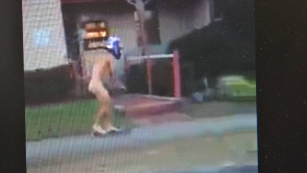 This nude scooter rider makes his way to the Roxy Cinema in Berry Street, Nowra.