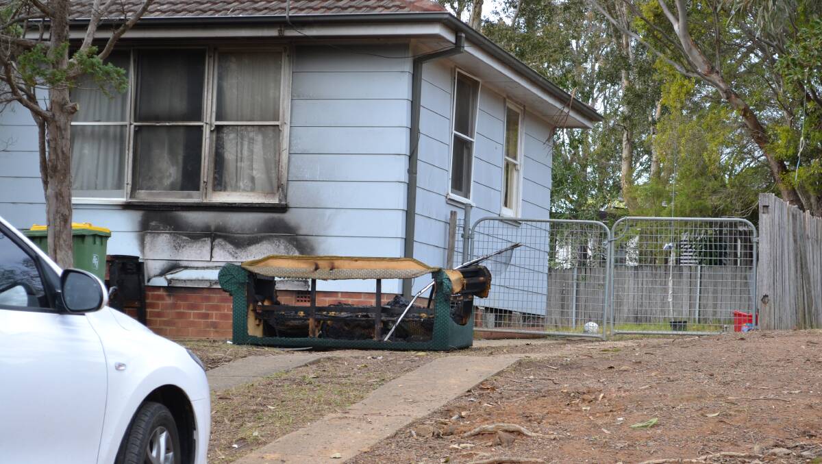 The burnt out lounge police suspect was deliberately set alight in front of an East Nowra house on Tuesday night.