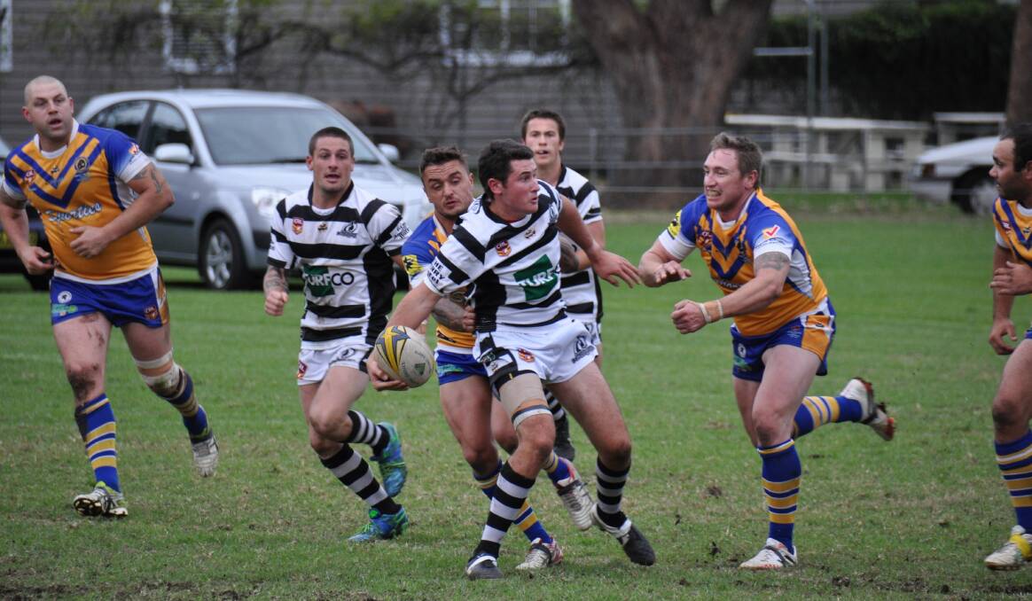 OFFLOAD: Berry Magpies five-eighth Josh Ingold looks for some support play during Saturday’s loss to Warilla-Lake South. Photo: GILLIAN LETT  