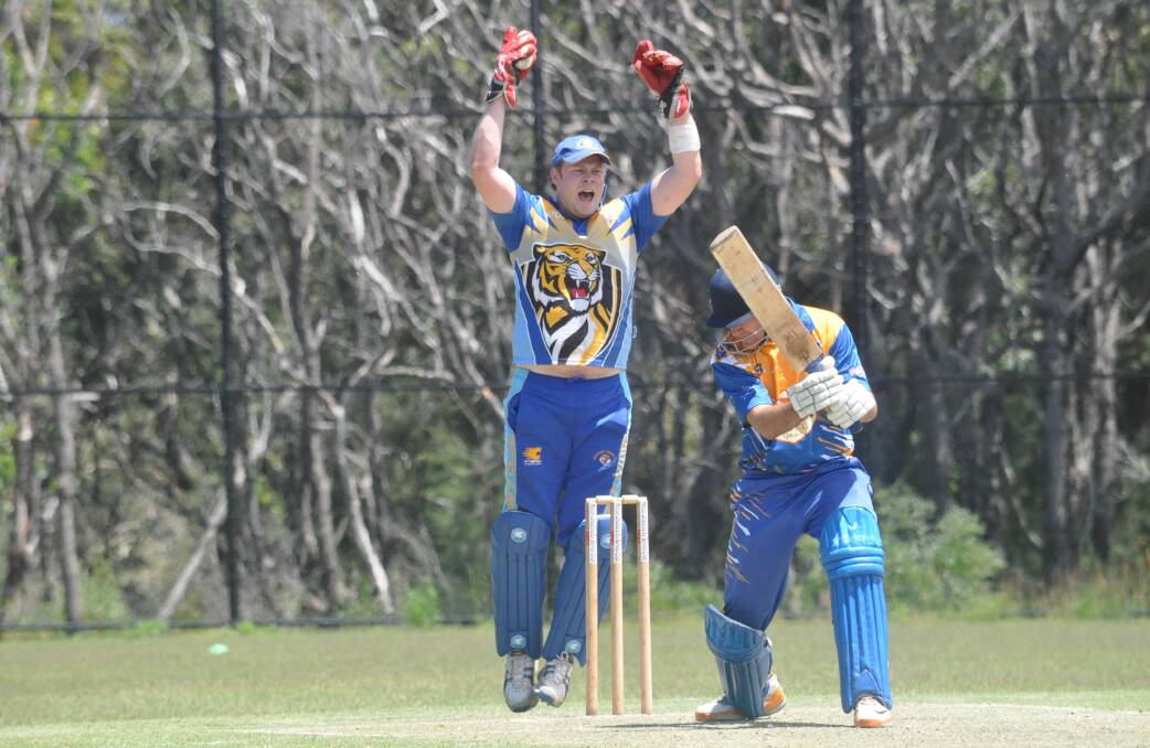 JUBILATION: Bomaderry keeper Paul Sawkins celebrates after taking the wicket of Ulladulla captain Aaron Wester during Saturday’s win. Photo: PATRICK FAHY  