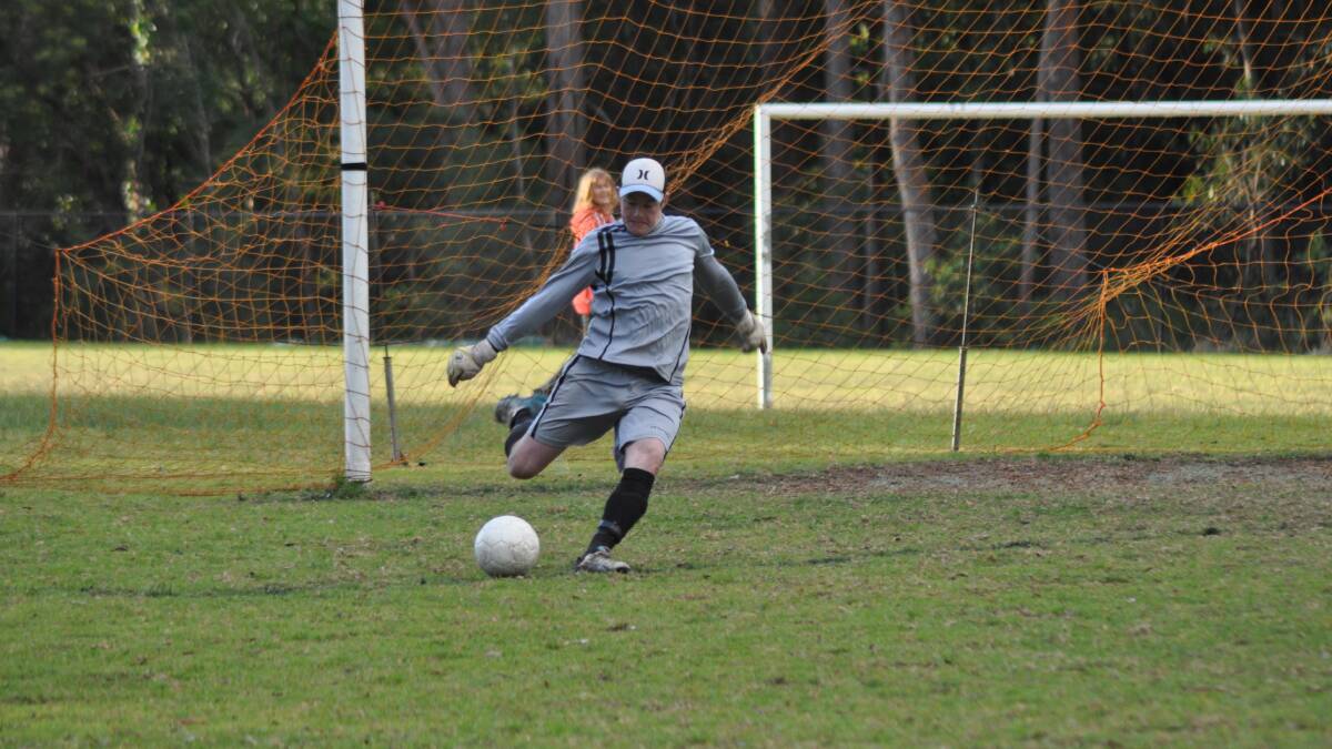 MAN OF THE MOMENT: St Georges Basin keeper Brandon Labb saved a penalty to help his side to a 2-1 win over Illaroo on Saturday. Photo: PATRICK FAHY  