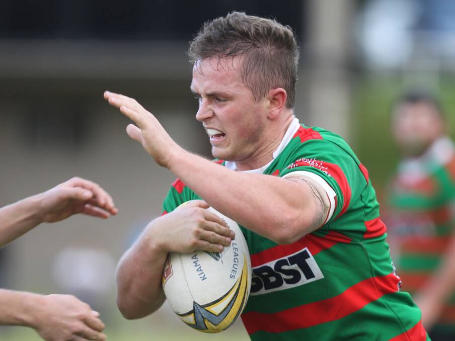 FLY SWATTER: Jamberoo Superoos forward James Gilmore gives the Albion park-Oak Flats defenders the big don’t argue during their 36-12 win at Centenary Field on Sunday. Photo: DAVID HALL    