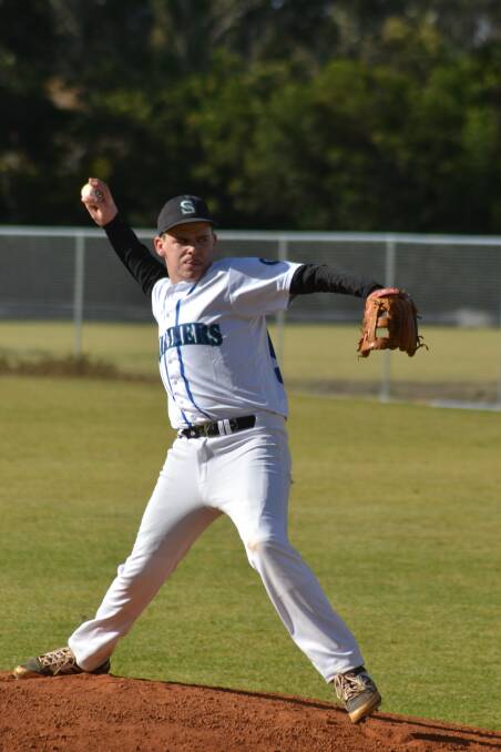 PITCH PERFECT: Shoalhaven Mariners pitcher Brenton McMahon throws one down during the first grade game against Berkeley, in their first home game at Ison Park on Saturday. Photo: PATRICK FAHY  