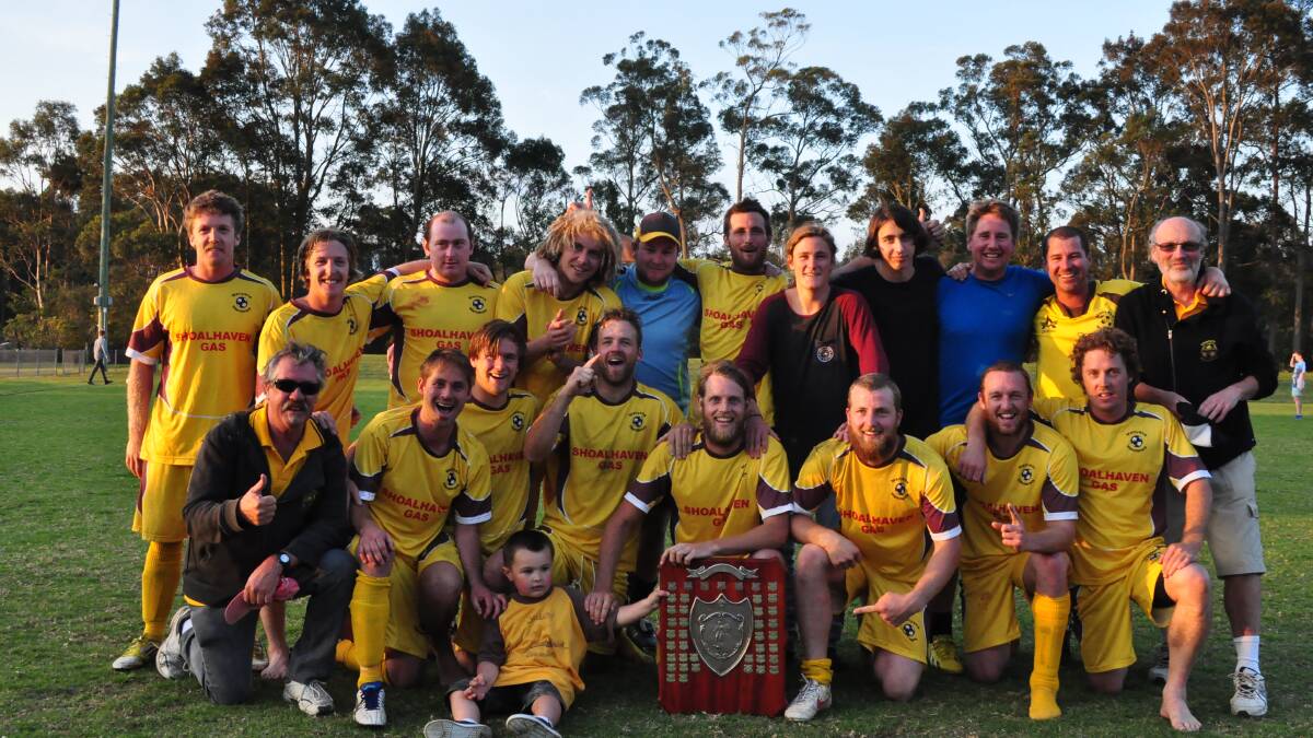 HASTA MANYANA: The Manyana Wanderers celebrate after defeating Culburra 1-nil in Saturday’s grand final, to claim their second Shoalhaven Football premiership. 