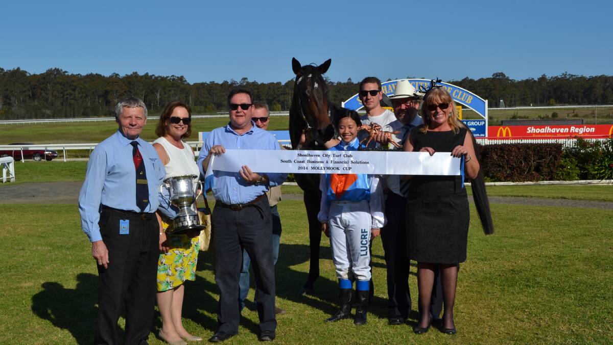 WINNERS CIRCLE: Shoalhaven City Turf Club Chairman Ian Whitby, Owners Sue and Tony Watson, Trainer Steve Englebrecht, Jockey Deanne Panya, race sponsors Tony Cottam
and Karen Bashford from South Coast Business & Financial Solutions.
