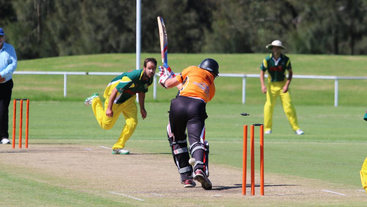 BOWLED HIM: Batemans Bay’s Andrew Malcolm is clean bowled by Trevor Thomason during Ex-Servos win on Saturday. Photo: GAV LADMORE  