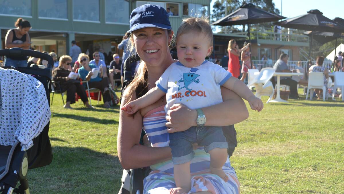 Kristy Lyttle and Max Kemp from Sussex Inlet have a great time at the 2014 Greenwell Point Cup day at the Shoalhaven City Turf Club on Sunday. 