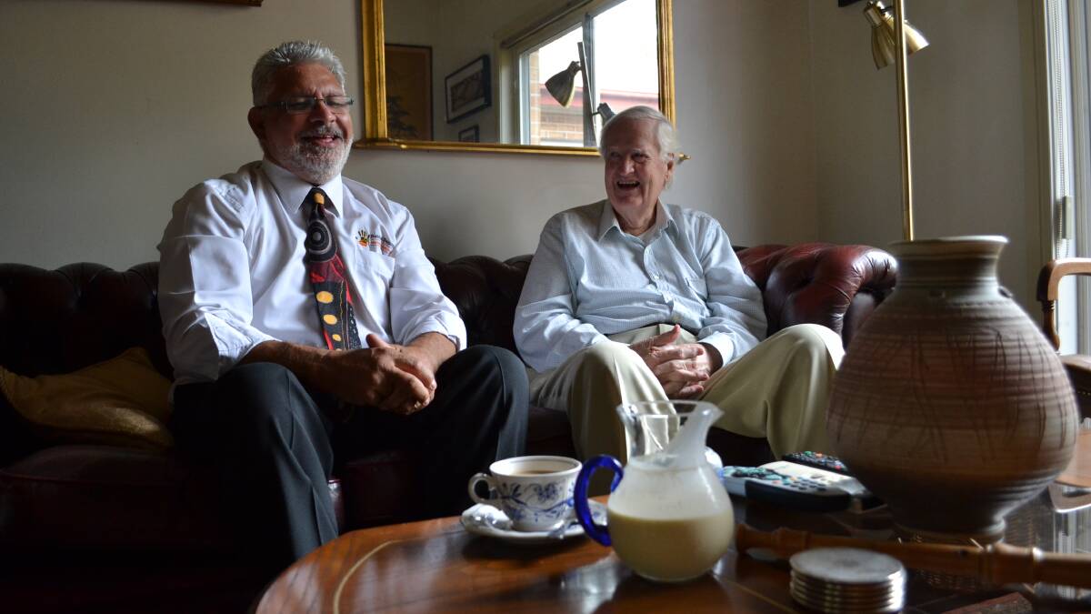 Habitat Personnel managing director Gerry Moore and finance specialist “Uncle” Bill Moyle enjoy a cup of tea and a chin wag at Bill’s Vincentia home.