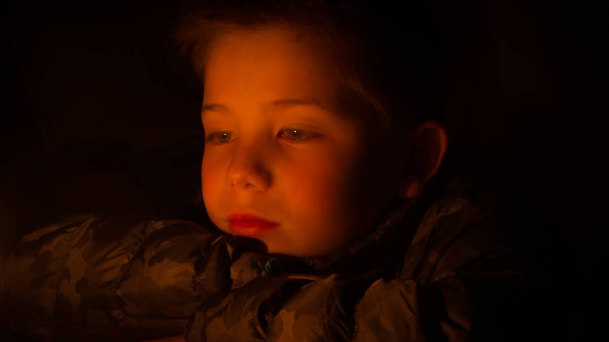 Sue Tolley’s candlelit portrait of a little boy, Captivated, was awarded best of set subject at the Bay and Basin Camera Club’s monthly meeting.