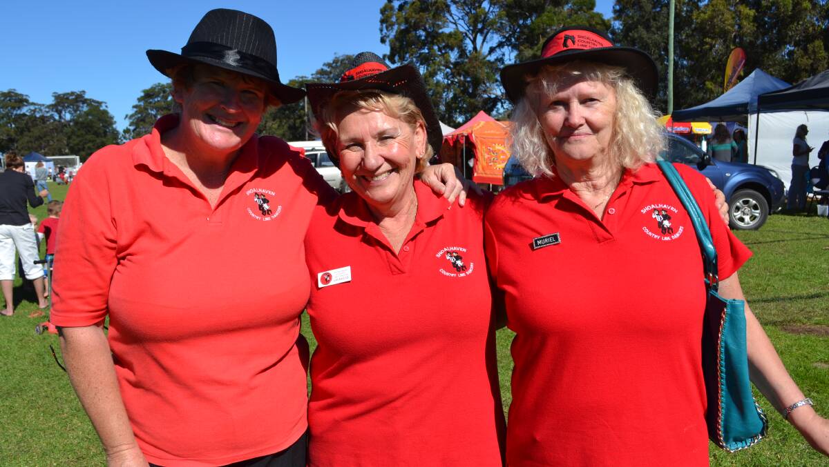 Leanne Slee, Laurelle Barrett and Muriel Jones from the Shoalhaven Country Line Dancers perform at the White Sands Easter Festival at Huskisson on Saturday.  