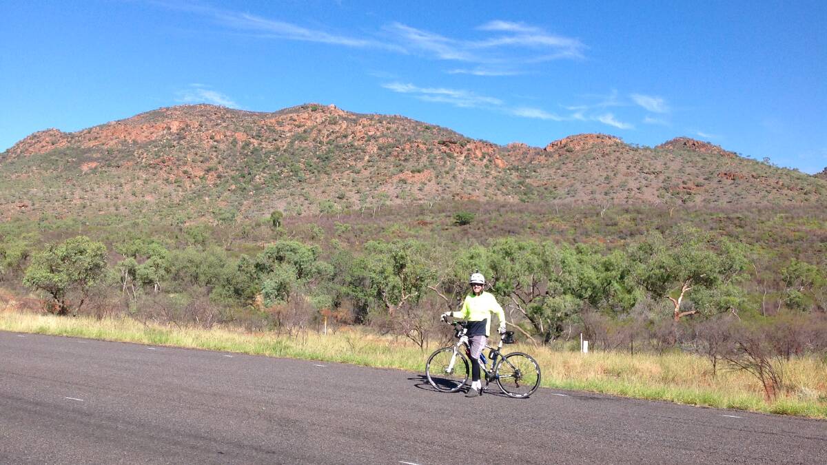 Michael Davey, who is cycling around Australia for the Kids With Cancer Foundation, on the road between Cloncurry and Mt Isa.