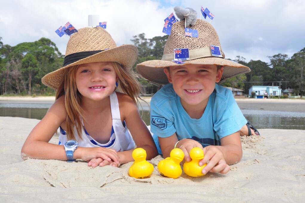 Siblings Jaxon and Ava O'Brien get ready for last year's duck derby and Aussie hat competition at Moona Moona Creek reserve in Huskisson.