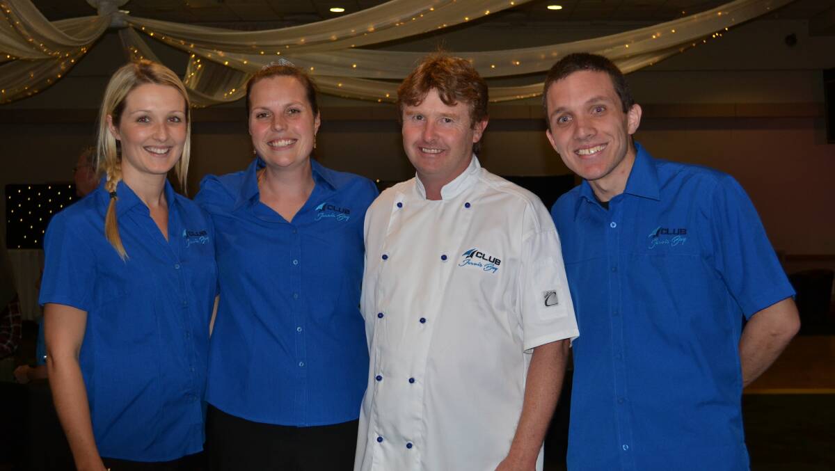 Club Jervis Bay staff Natalie Buckley, Ben Jeffcott, Mel Logan and Graeme Logan keep guests happy at the Club Jervis Bay’s Members’ Party Night on Saturday.