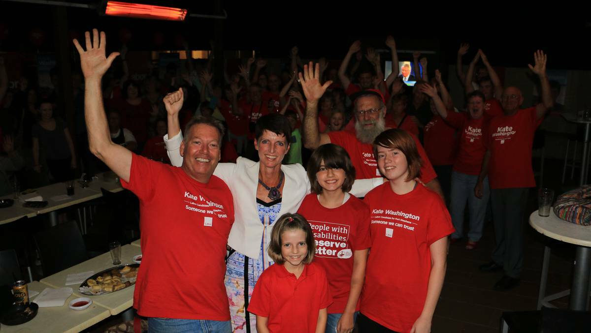 Labor candidate Kate Washington with friends and family at Lakeside Tavern on Saturday night, celebrating the win.