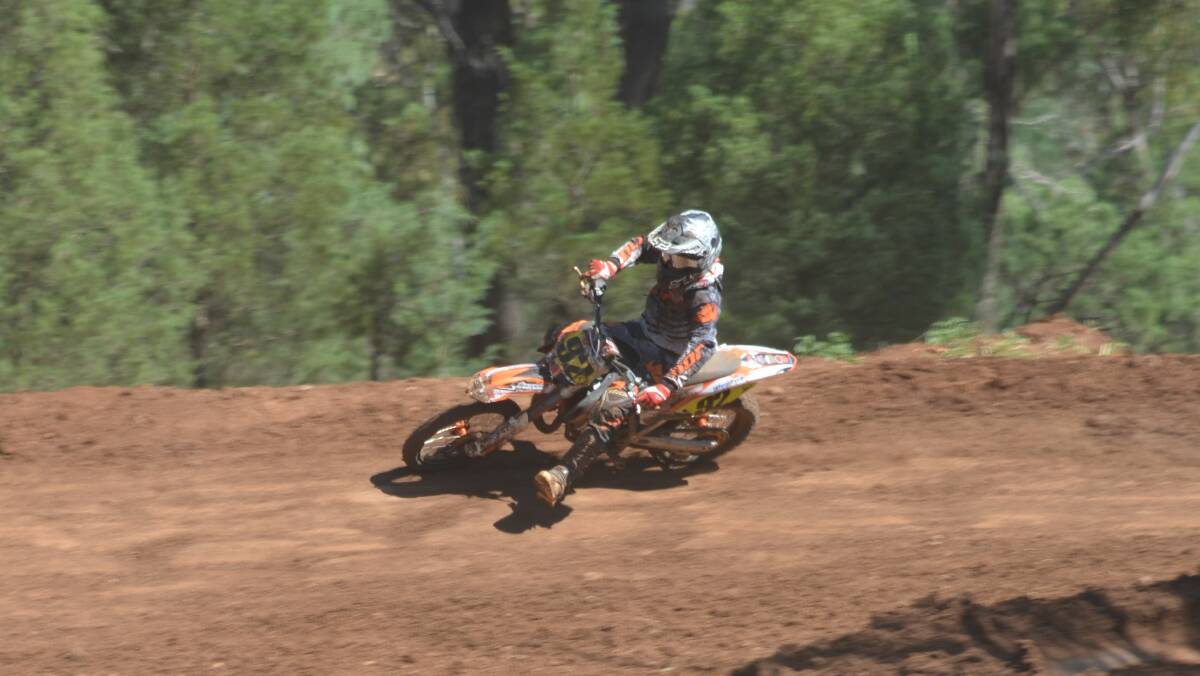 DIRT DEMON: Dante Hyam tackles a corner during round one of NSW junior Motorcross Championships in Dubbo.