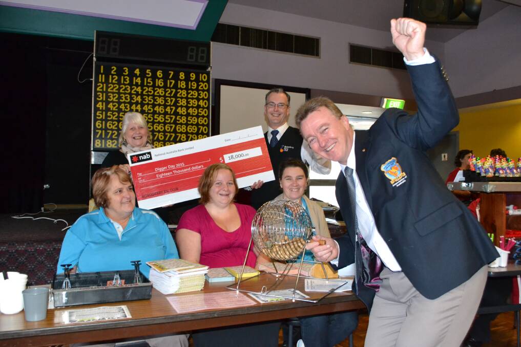 BIG WIN: Nowra RSL Sub Branch secretary and Digger Day co-ordinator, Rick Meehan (front) gets into the fund-raising spirit with members of the Bomaderry RSL Club Charity Trust Committee, chairman Chris Hayward, Julie Mather, Tilly Drake and Stacey Flentjar with Bomaderry RSL secretary manager Brett Hills.