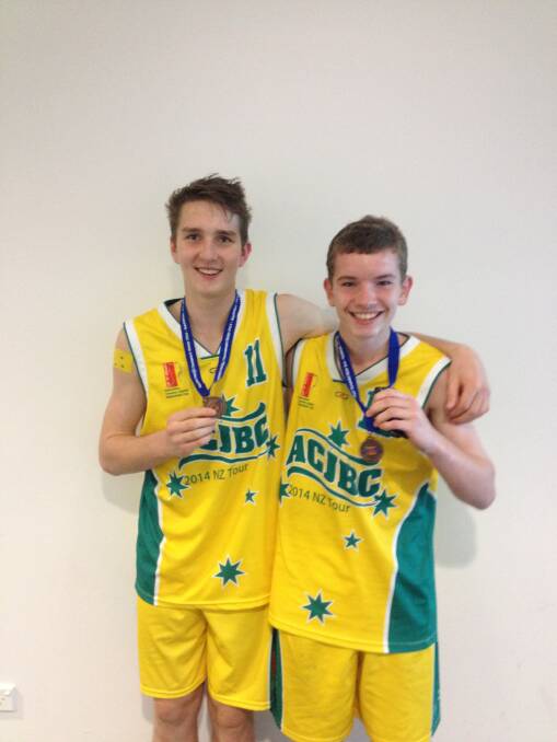 A LONG WAY FROM HOME: Shoalhaven’s Trent Hilaire and Gavin Costain show off their matching bronze medals from the Pacific Rim Championships in New Zealand. 