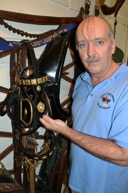 LEATHER TREATMENT: Paul Bradshaw from Nowra won first place with his heavy horse bridle at the Sydney Royal Easter Show.