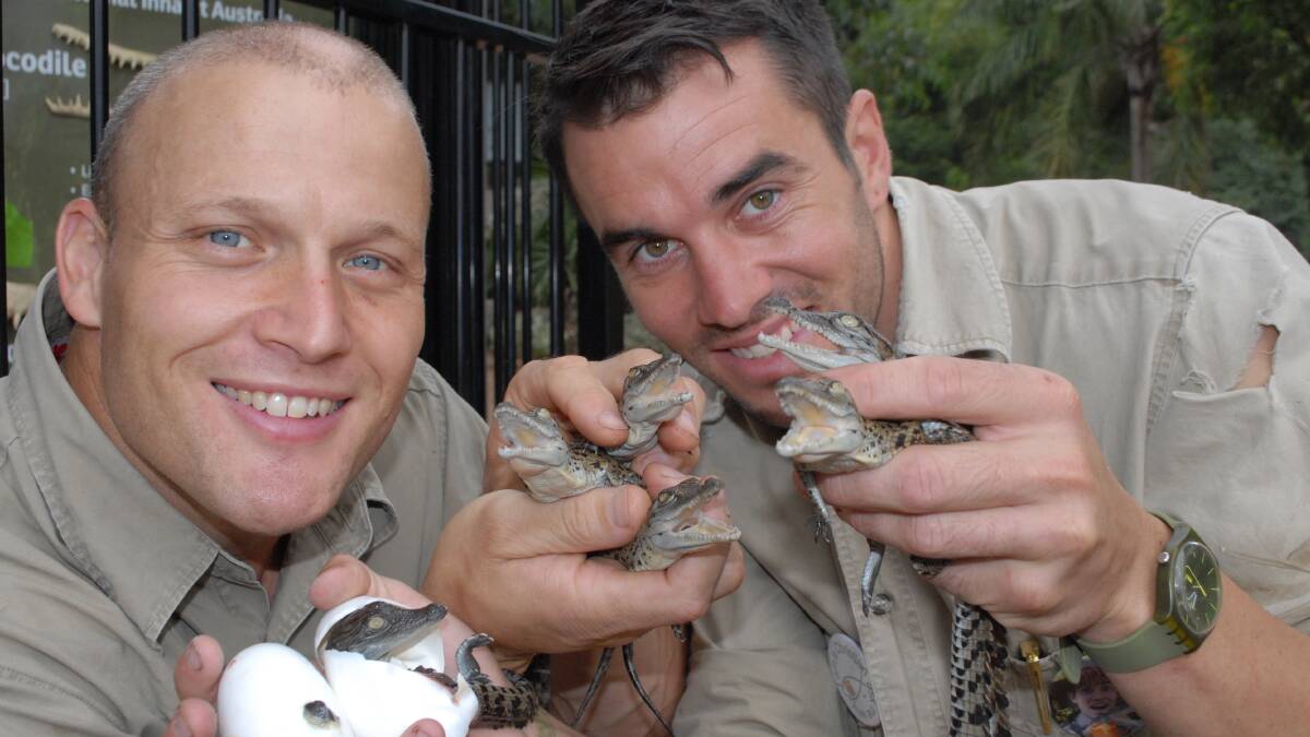 ANIMAL KINGDOM: Shoalhaven Zoo owner Nick Schilko and animal handler Trent Burton have respect for crocodiles. 
