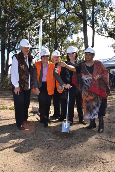 PROGRESS: Grand Pacific Health chairperson Dr Vicki McCartney turns the first sod for the new Nowra GP Super Clinic with Shoalhaven Mayor Joanna Gash, deputy chairperson of the Illawarra Shoalhaven Local Health District Jill Boehm, South Coast MP Shelley Hancock and local Aboriginal elder Aunty Jean Carter.