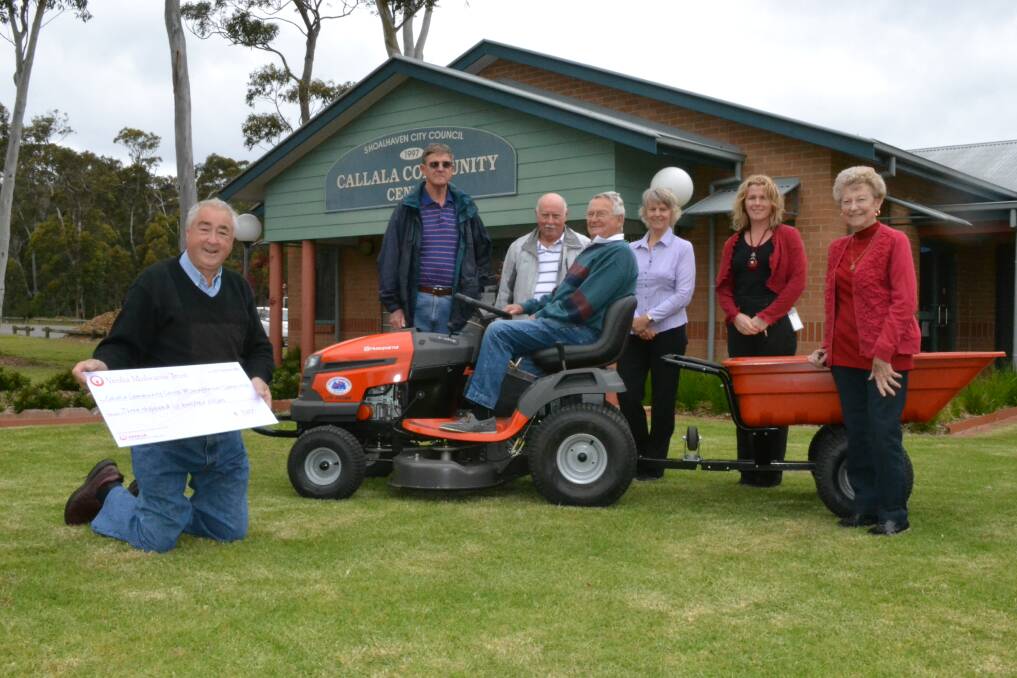 VROOM: Callala Community Centre Management Committee members joined by Shoalhaven City Council facilities officer Donna Sullivan and landscape architect Kay Murray with their new ride-on lawn mower (from left) treasurer Howard Duncan, maintenance team members Jim Townsend and Bill Price, president Ray Coid and secretary Elaine Coid.