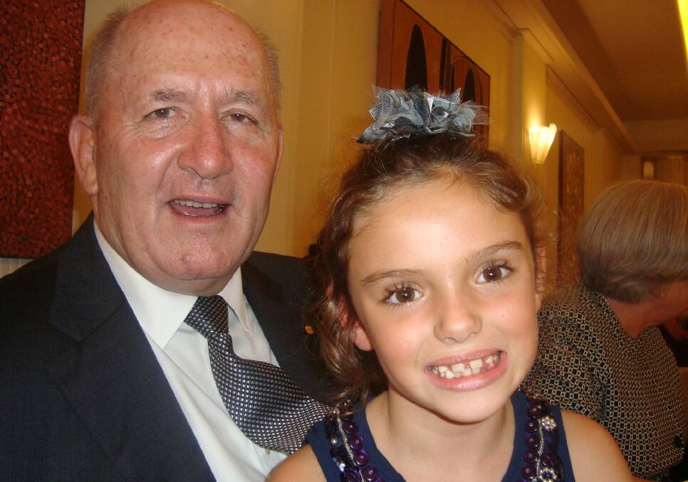 ROYAL ROLE: Bailey Bergin takes pride of place on the lap of her great uncle, Governor-General Sir Peter Cosgrove after he was sworn in as the Queen’s representative in Australia.