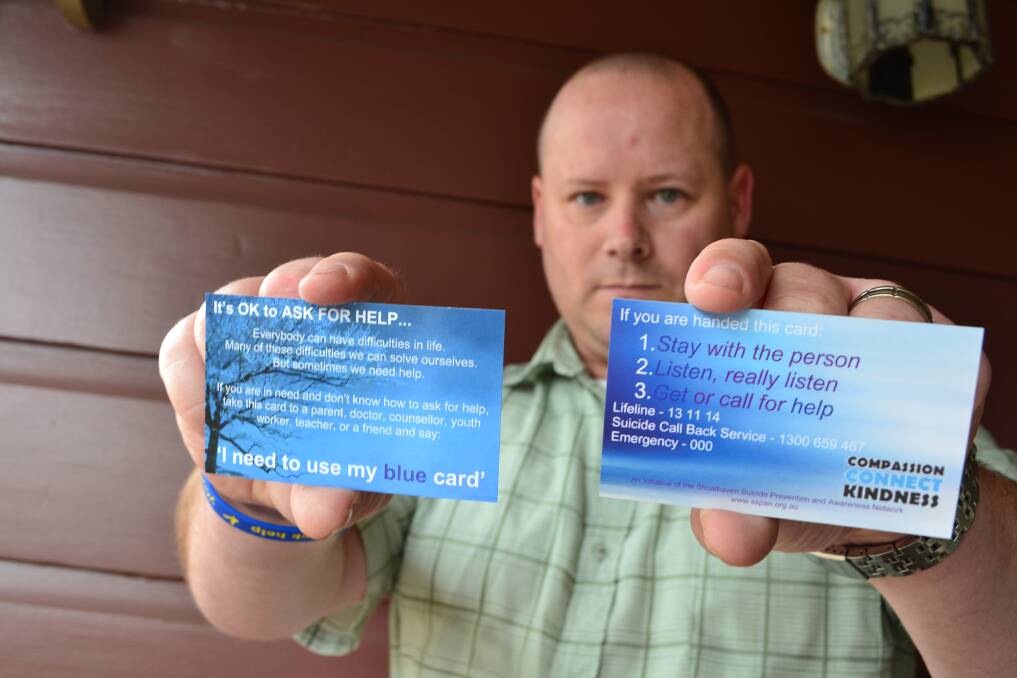 HELP IS AT HAND: Shoalhaven Suicide Prevention and Awareness Network vice-chairman Tim Hudman with the blue card that has been launched locally to help young people access help.