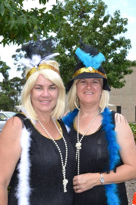 Wendy Miller from North Nowra and Lisa Carroll from Nowra are with the Gatsby Gardenias who currently sit in top spot on the donations leaderboard and look fabulous at the Shoalhaven Entertainment Centre on Saturday.
