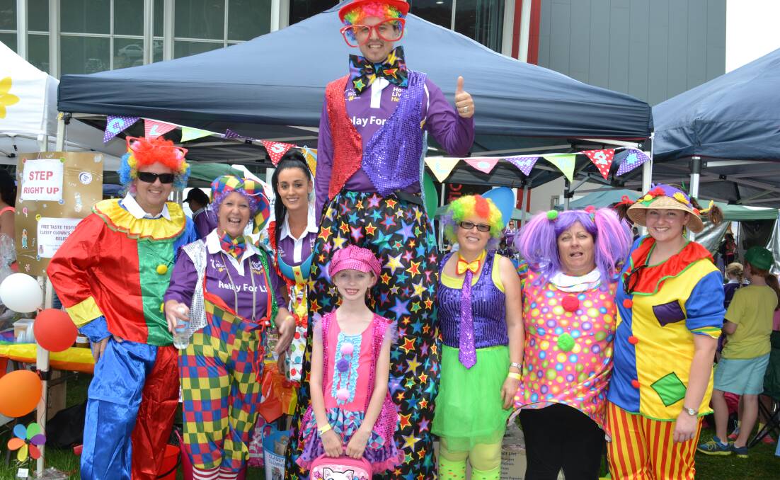 Classy Clowns Mick Annable from Nowra, Kaylene and Samantha Hearne, Doug Annable from North Nowra, Trista Black from Bomaderry, Ingrid Johnston from North Nowra and Leanne Semple from Old Erowal Bay sit in second place on the donations leaderboard and fill the Relay For Life with colour at the Shoalhaven Entertainment Centre on Saturday.