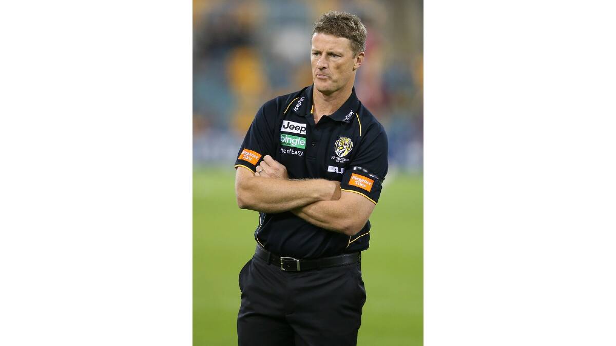  Tigers coach Damien Harwick looks on during the round five AFL match between the Brisbane Lions and the Richmond Tigers at The Gabba on April 17, 2014 in Brisbane, Australia. Photo: Chris Hyde/Getty Images.
