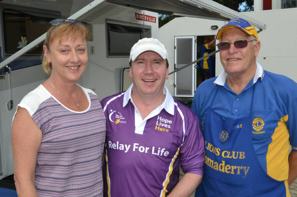 NEW FRIENDS: Leisa Goatcher and Matt Harwood from Nowra with Bevin Hardy from North Nowra have a great catch up at the Relay For Life at the Shoalhaven Entertainment Centre on Saturday.