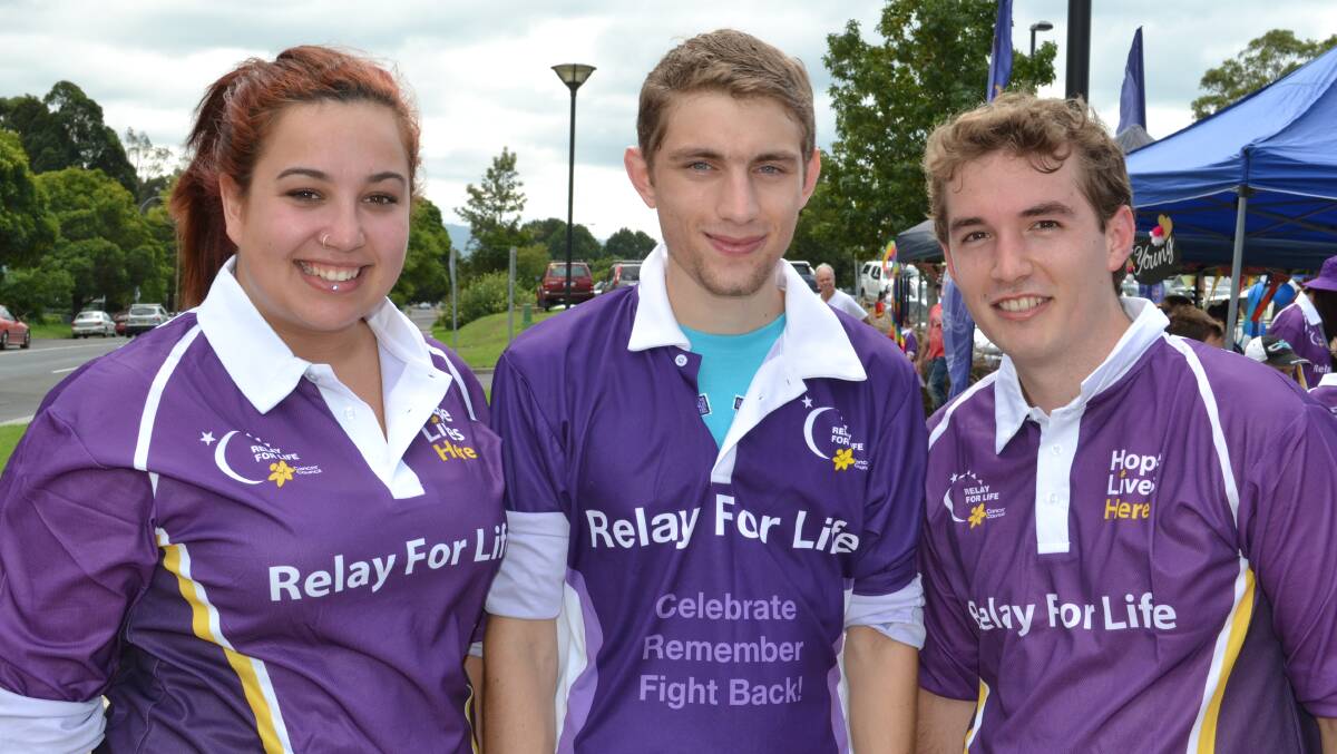 IN PURPLE: Alana Maihi from Sussex Inlet, Bradley Sawyers from Falls Creek and James Pellizzon from Wollongong put on the Relay For Life shirts and are walking their laps to raise money for the Cancer Council at the Shoalhaven Entertainment Centre on Saturday.