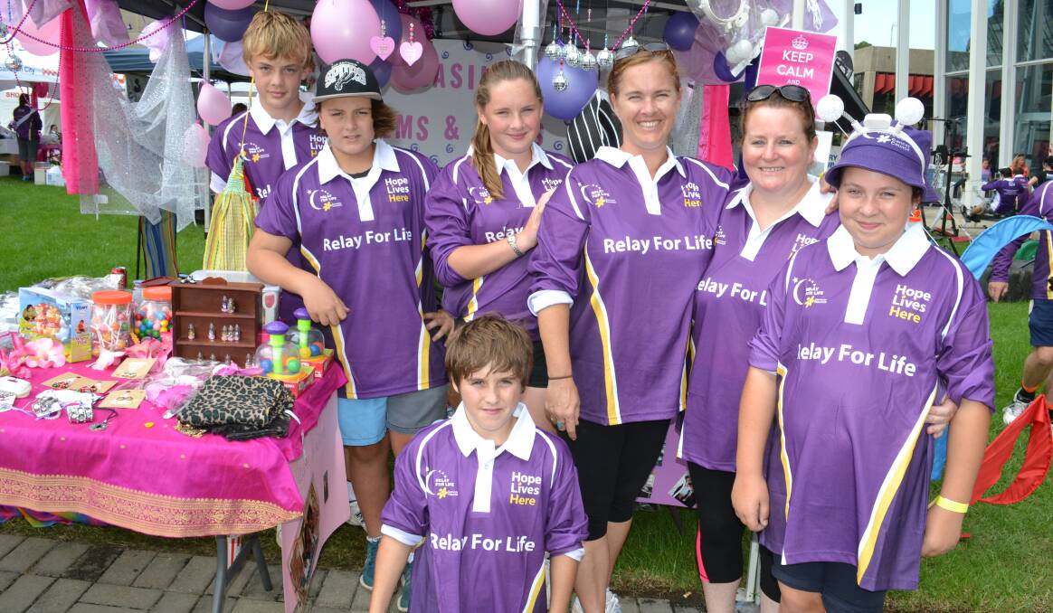GREAT TEAM: Luke Fletcher, Jayden Henkal, Emily and Lee Fletcher, Julie Green and Ella Reid with (front) Kane Laws from Basin View put their hearts into the Relay For Life cause at the Shoalhaven Entertainment Centre on Saturday.
