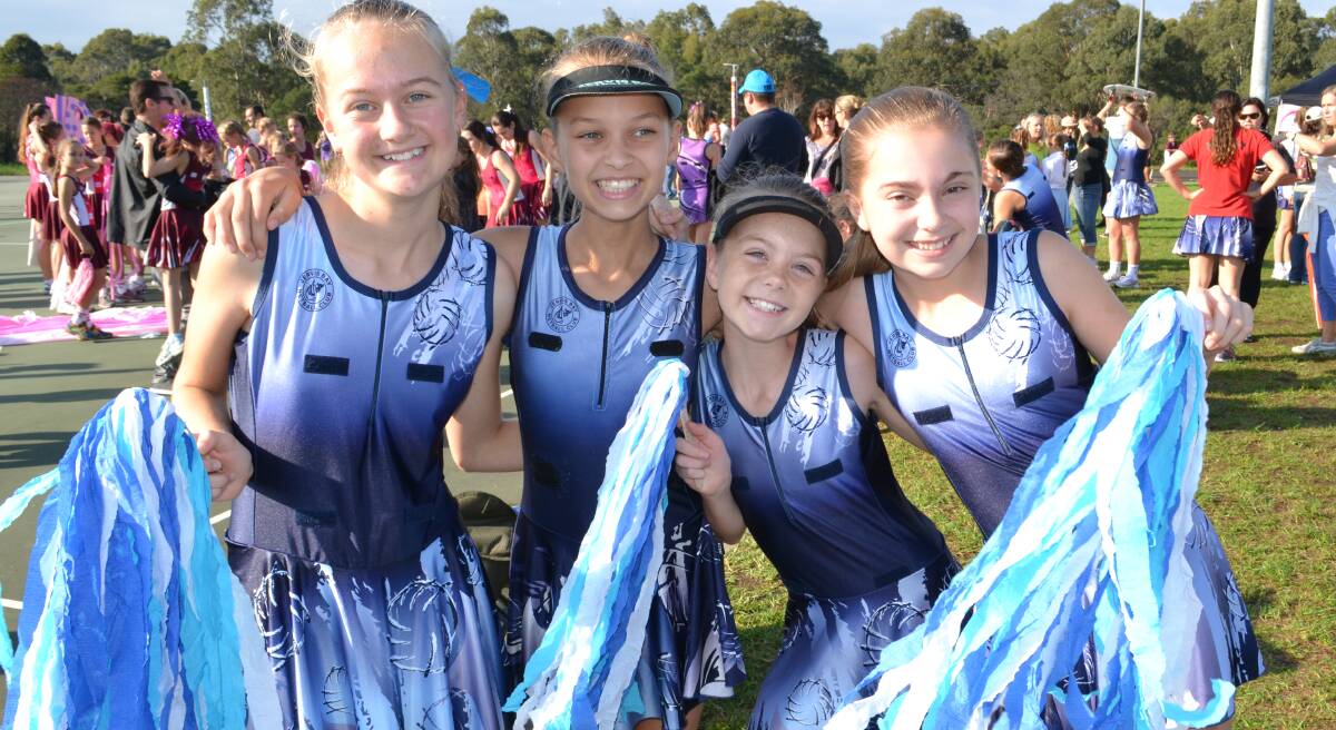 SEASON: Phoebe Sherer, Libby Phillips, Kasey Sherer and Lily Brown from Jervis Bay Netball Club get ready for a big season of netball at the Shoalhaven March Pass on Saturday.