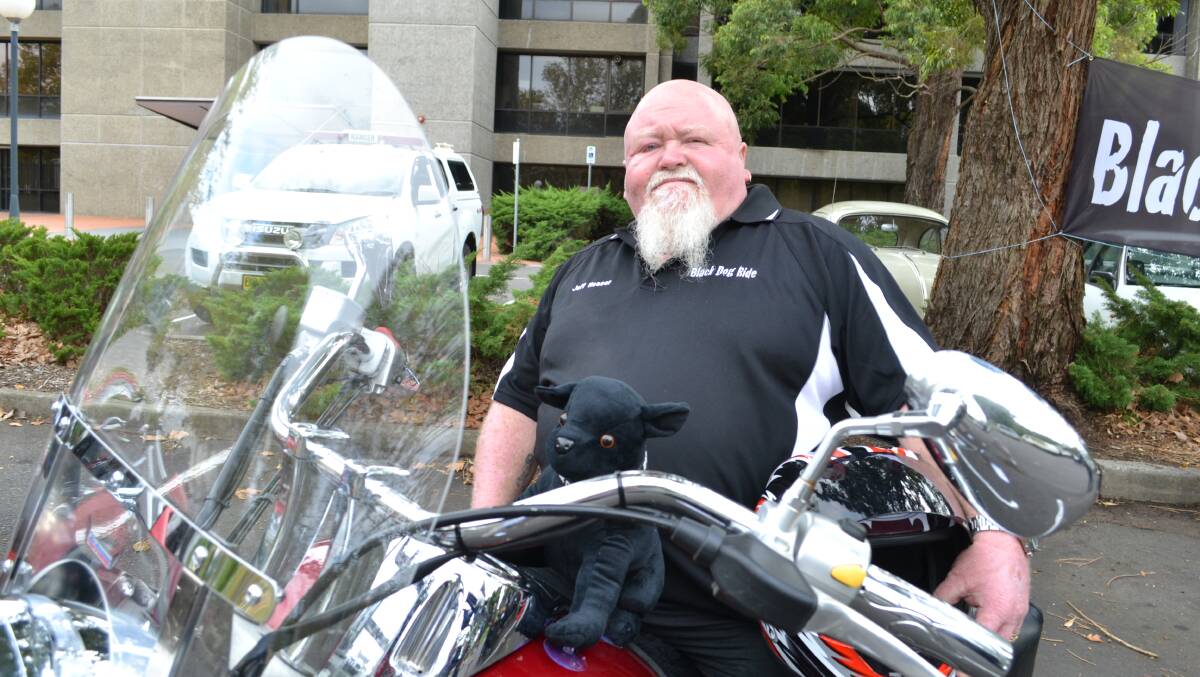 FORCE BEHIND THE FIRST SHOALHAVEN BLACK DOG RIDE were Jeff and Joanne Rosser from Kings Point. While Joanne could not make the ride, Jeff Prosser is on his bike with escort Winston ready to lead off on from the council car park on Sunday. 