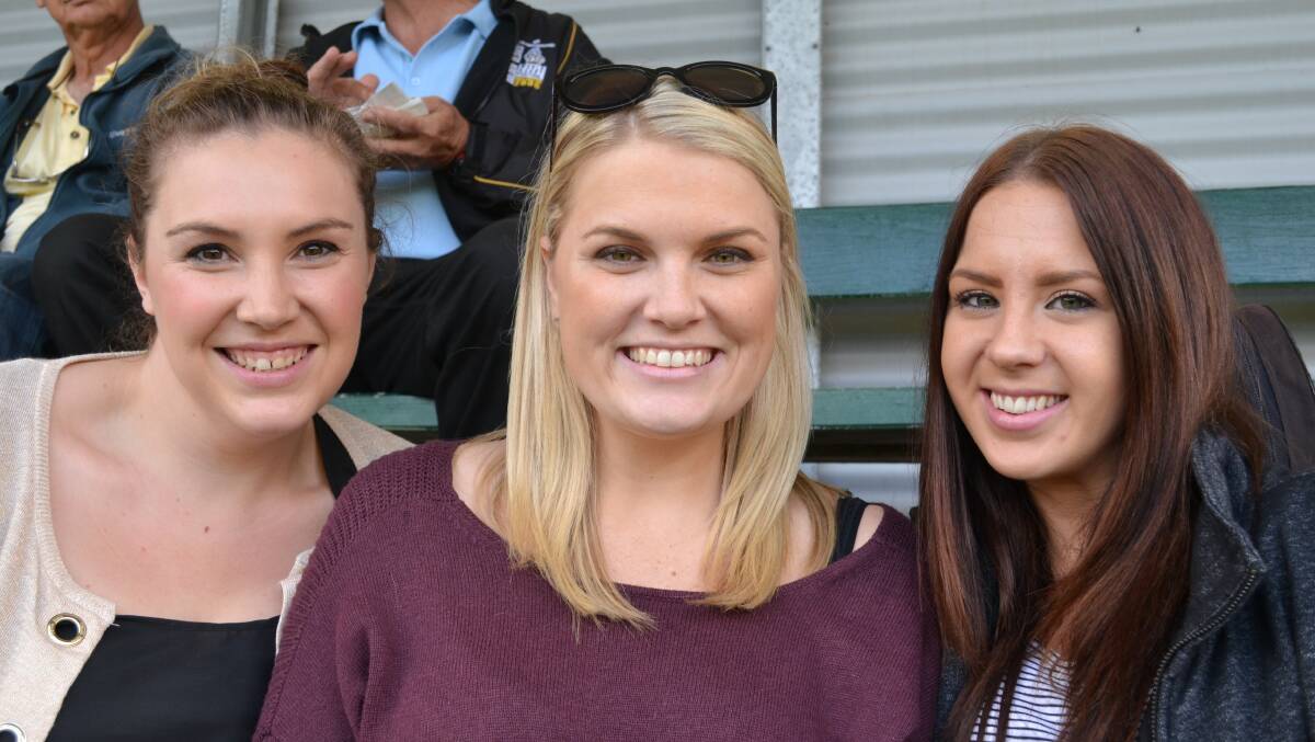 VIKING SUPPORTERS Tori Esler and Alyssa Simpson from Wollongong and Casey Hollick from Dapto didn’t mind braving terrible weather on Saturday to watch their team take on the Shoalies at Shoalhaven Rugby Park on Saturday, April 12. 