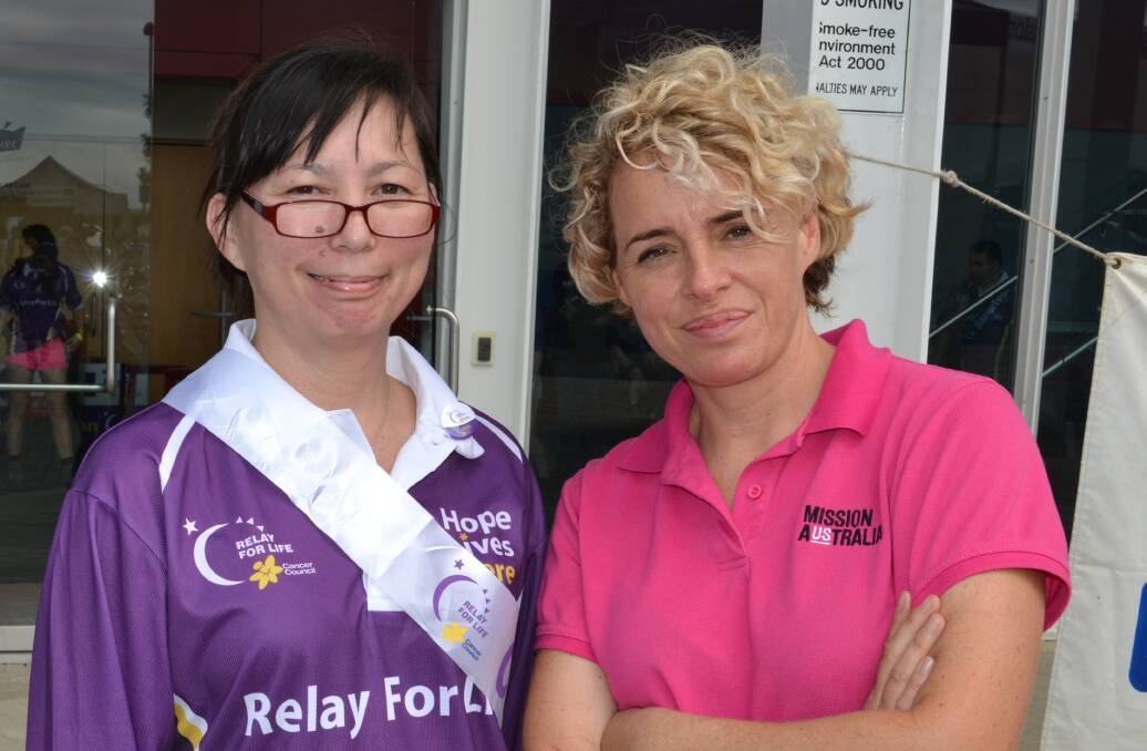 LAPS: Deborah Jeffrey from Cambewarra and Nicola Hussein from Vincentia stop for a chat at the Relay For Life charity walk at the Shoalhaven Entertainment Centre on Saturday.