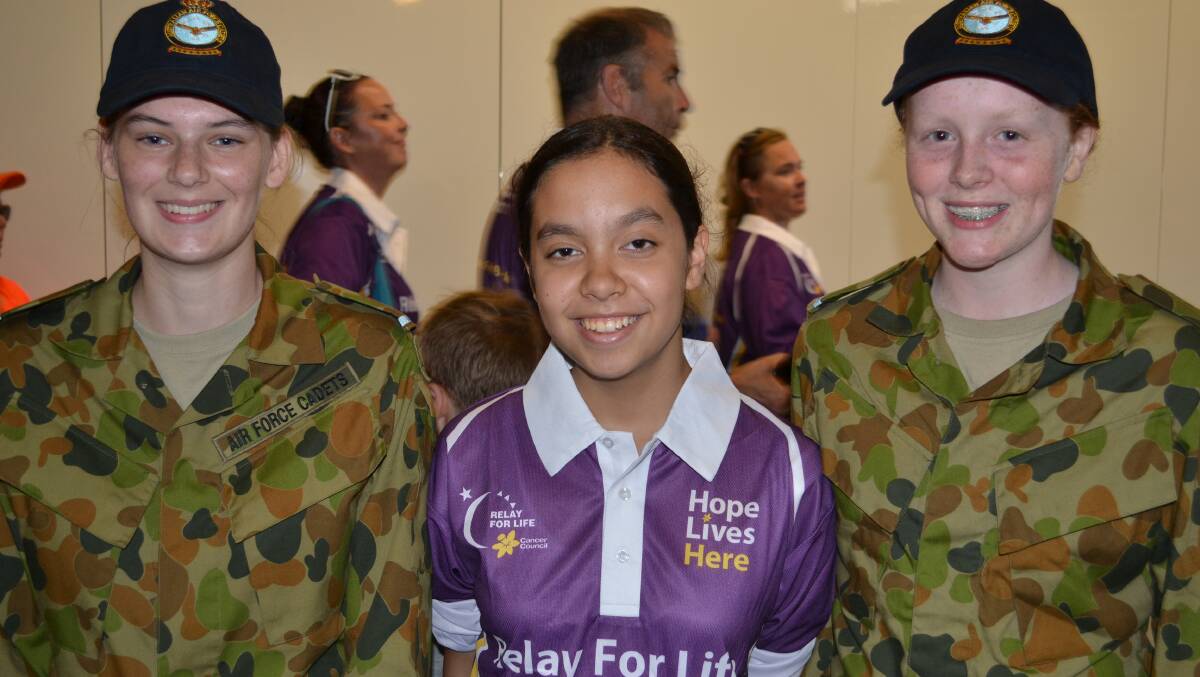 AIRFORCE CADETS: Lauren Foley from Nowra Hill, Rosie Peerless from Terara, Caitlin Fanning Moruya do their bit for cancer at the Relay For Life at the Shoalhaven Entertainment Centre on Saturday.