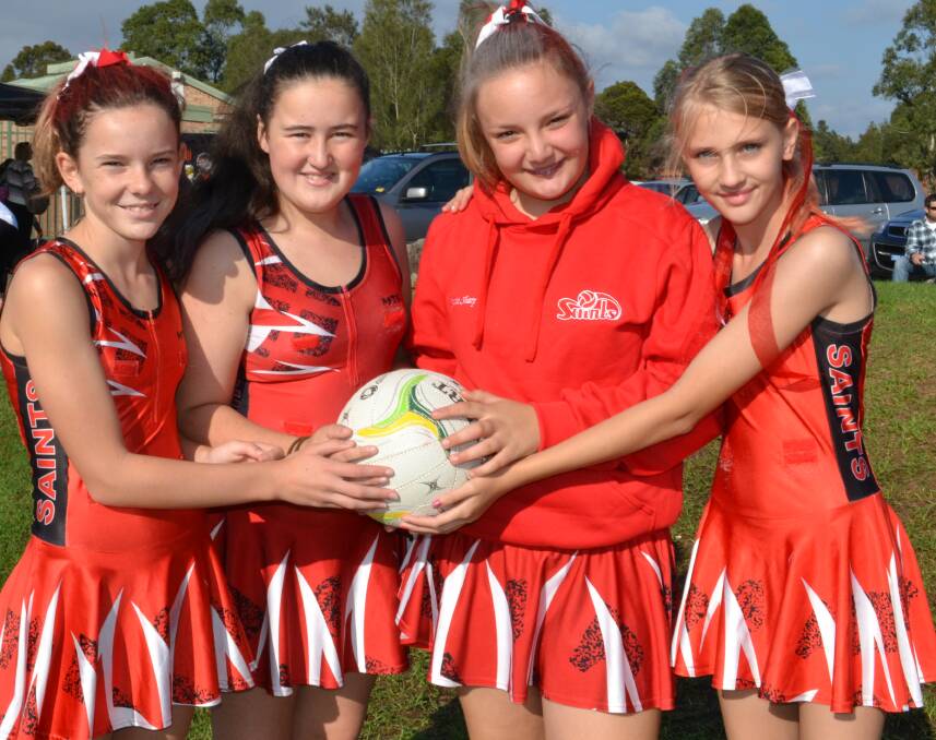 FUN: Jorja Morgan, Carly Luxford, Jessie Sharp and Emma Palmer from Saints Netball Club are ready for a full day of fun at the Shoalhaven Netball March Pass to mark the beginning of the season on Saturday.
