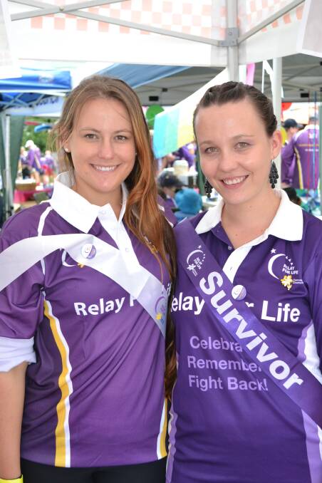 FIGHT BACK: Helena Daniels from Sanctuary Point and Kylie Wilson from Worrigee make a difference at the Relay For Life at the Shoalhaven Entertainment Centre on Saturday.