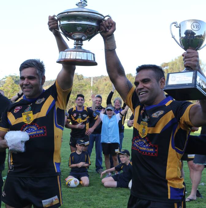 Nowra Bomadeerry jets captain Ben wellington and vice-captain Geoff Johnson celebrate their Group 7 premiership win.