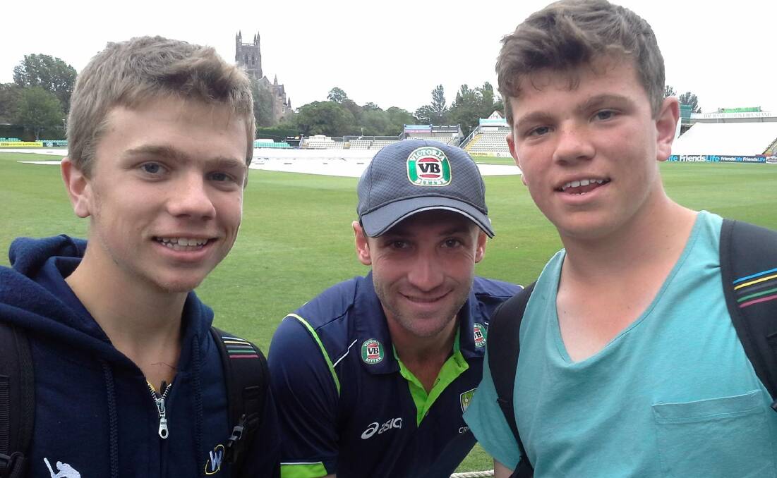 Nowra cricketing brothers Bradley and Adam Ison met Phillip Hughes last year during a cricketing tour of England.