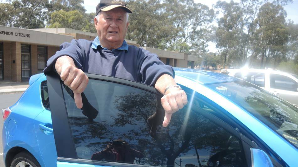 UNNECESSARY: Spring Gully man Hans Banset gives a big thumbs down to a proposal for senior drivers on Victorian roads to wear ‘S-plates.
